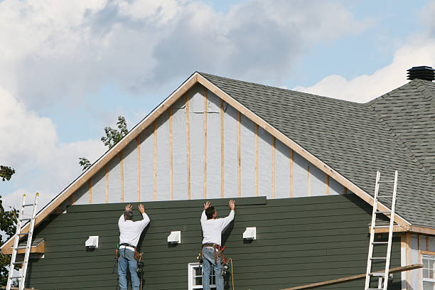 Professional Vinyl Siding technician working in Hudson, MA